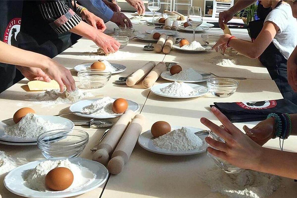a group of people making eggs on a table