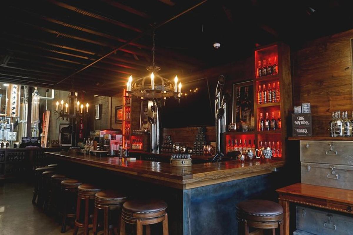 a bar with a bunch of stools in a room