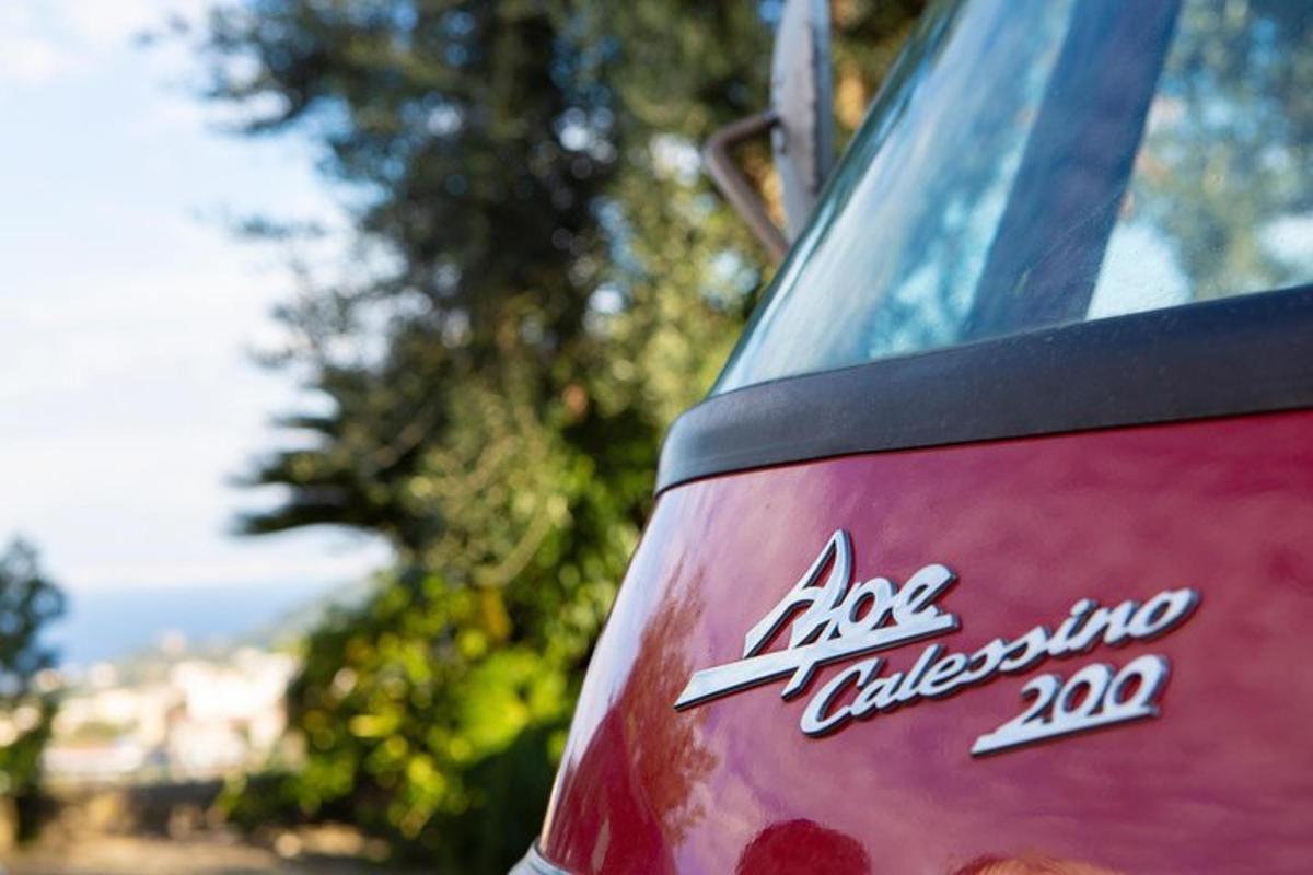 a close up of the front of a red car