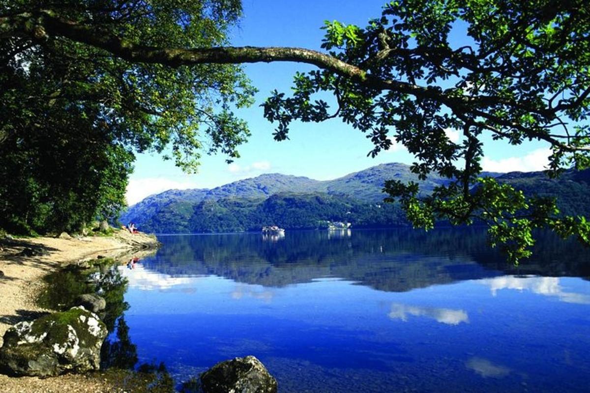 a view of a lake with mountains in the background