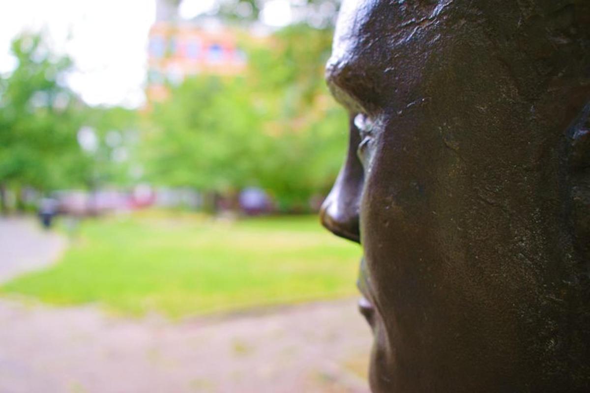 a close up of the face of a statue