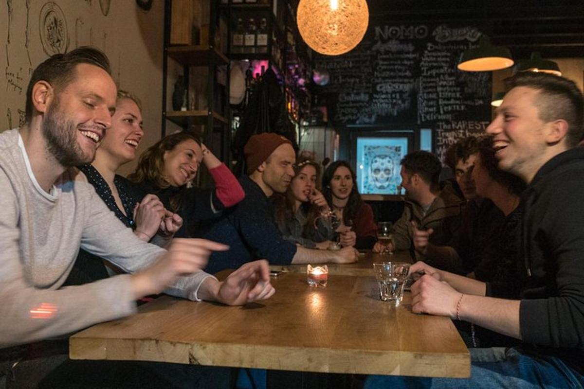 a group of people sitting at a table in a bar