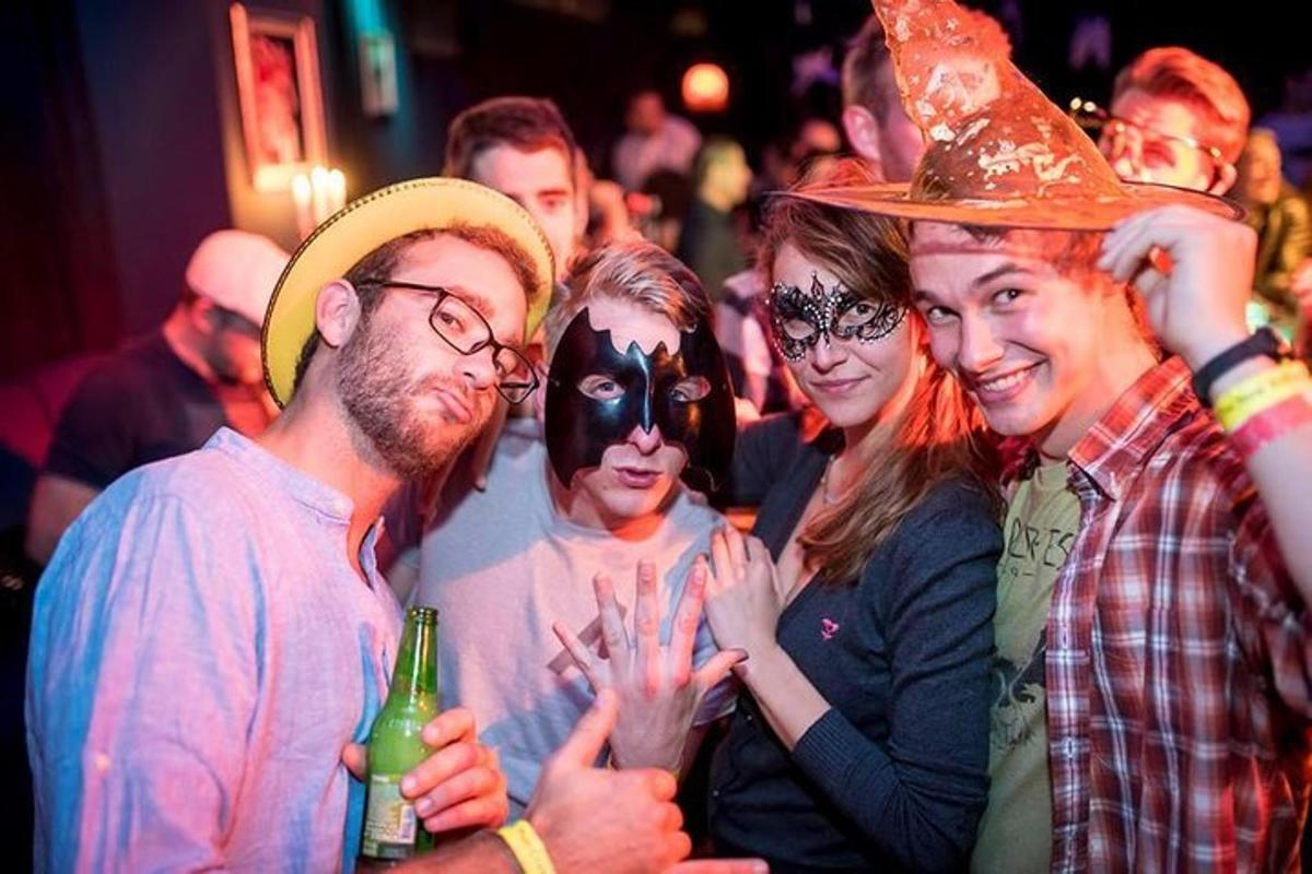 a group of people posing for a picture at a party