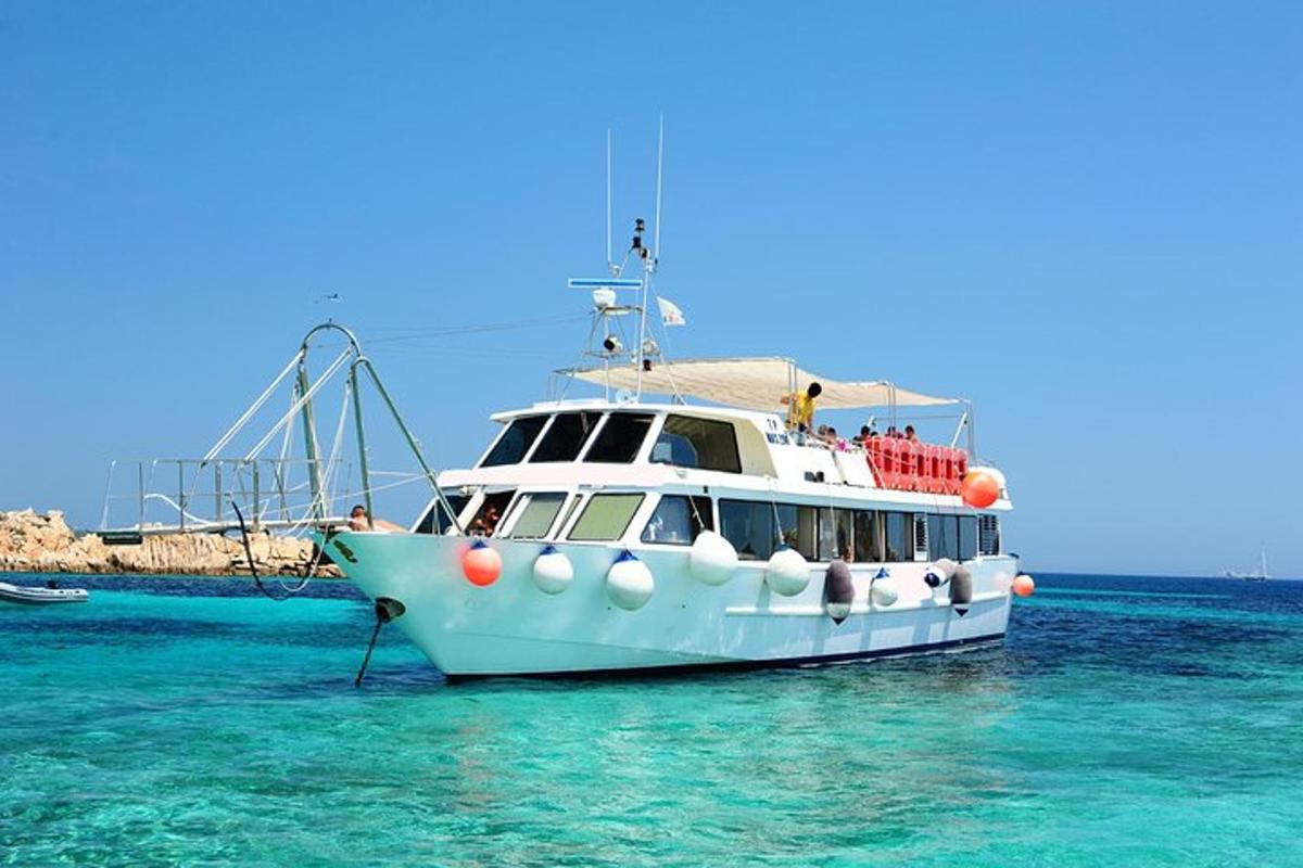 a white boat in the water in the ocean