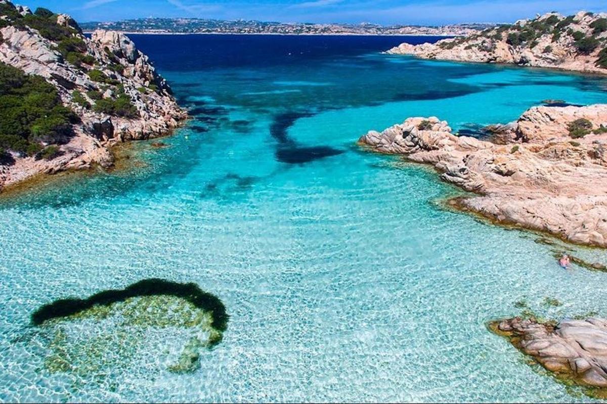 a large body of water with a heart in the water