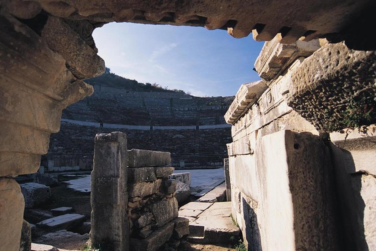a view of an amphitheater from a stone building