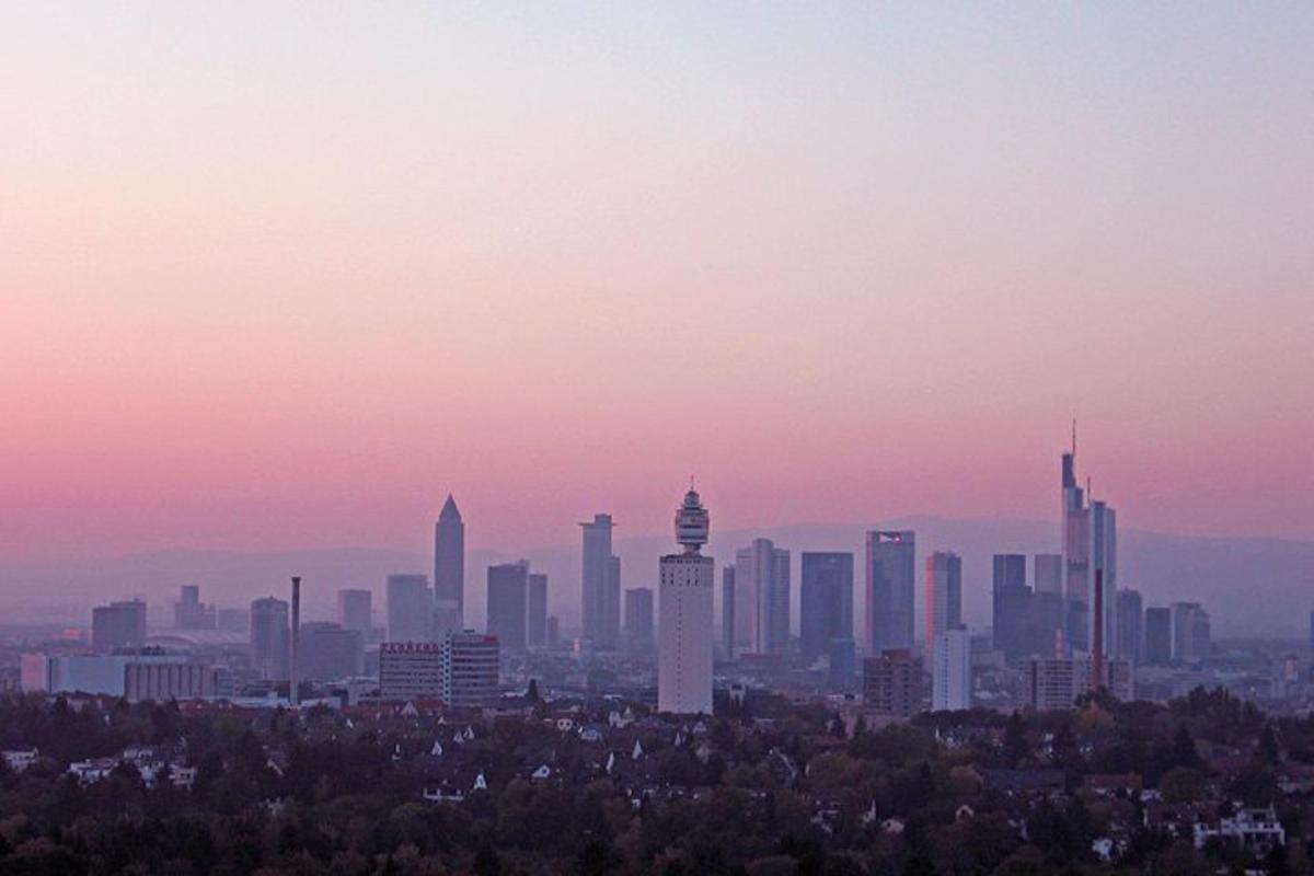 a view of a city skyline at sunset