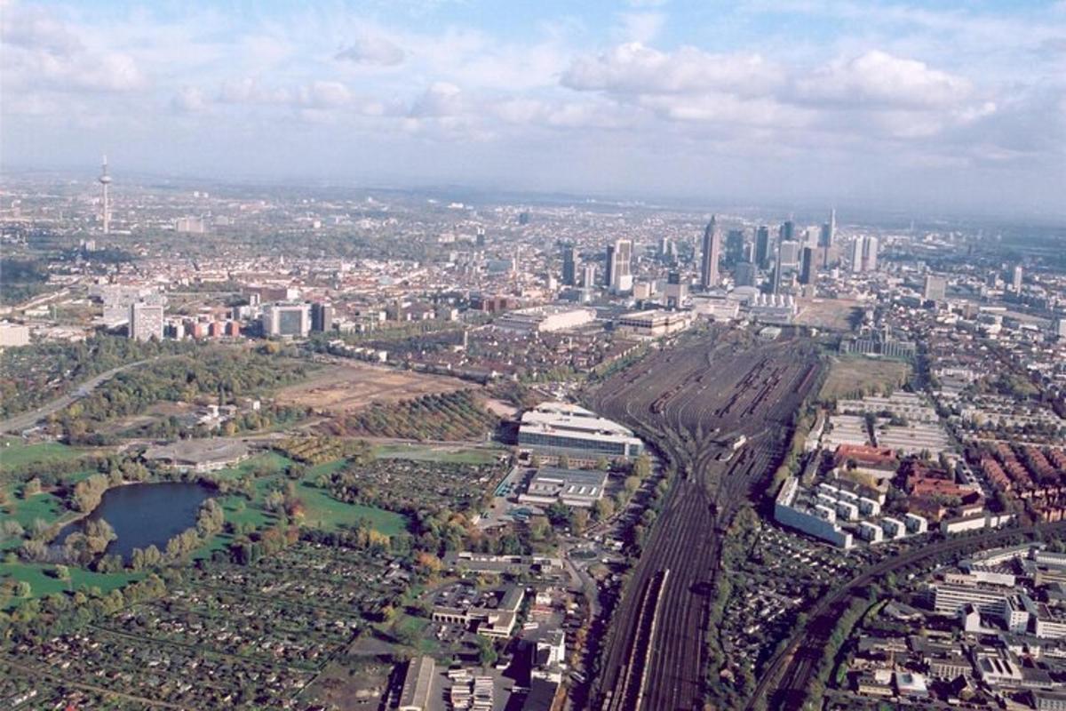 an aerial view of a city with buildings and roads