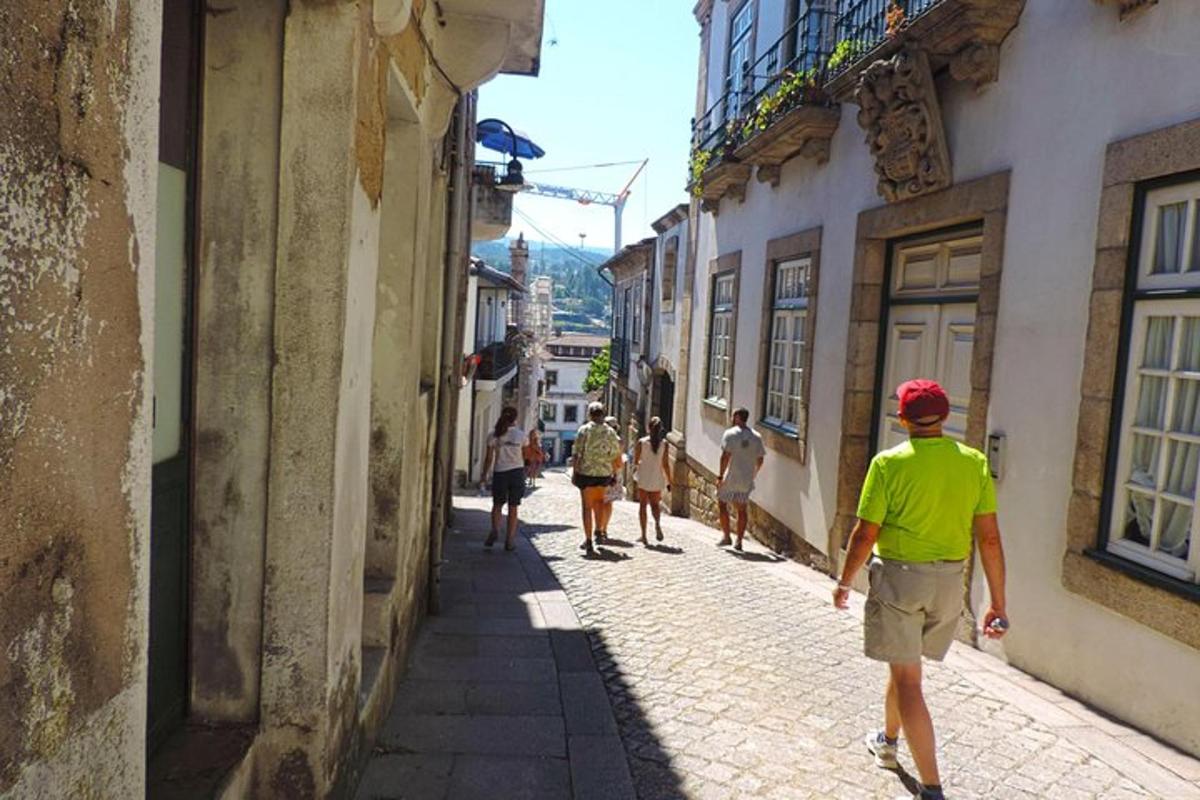 a group of people walking down a street