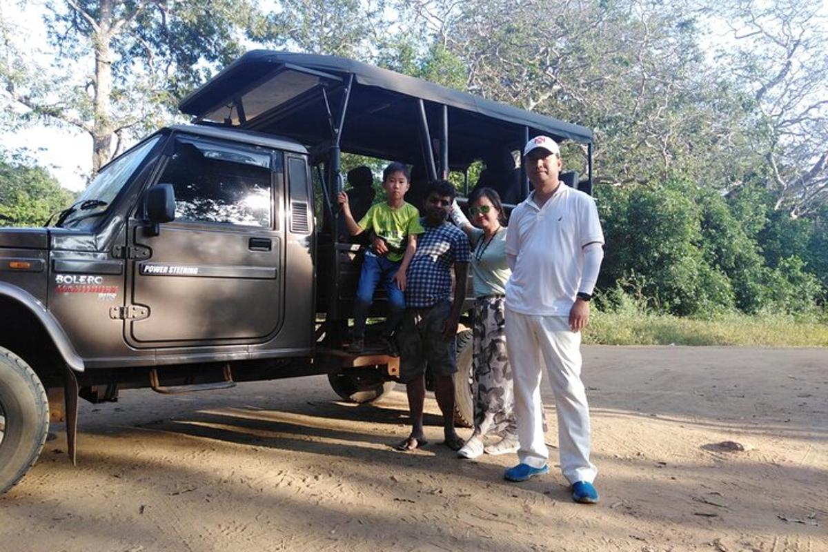 a group of people standing in the back of a truck
