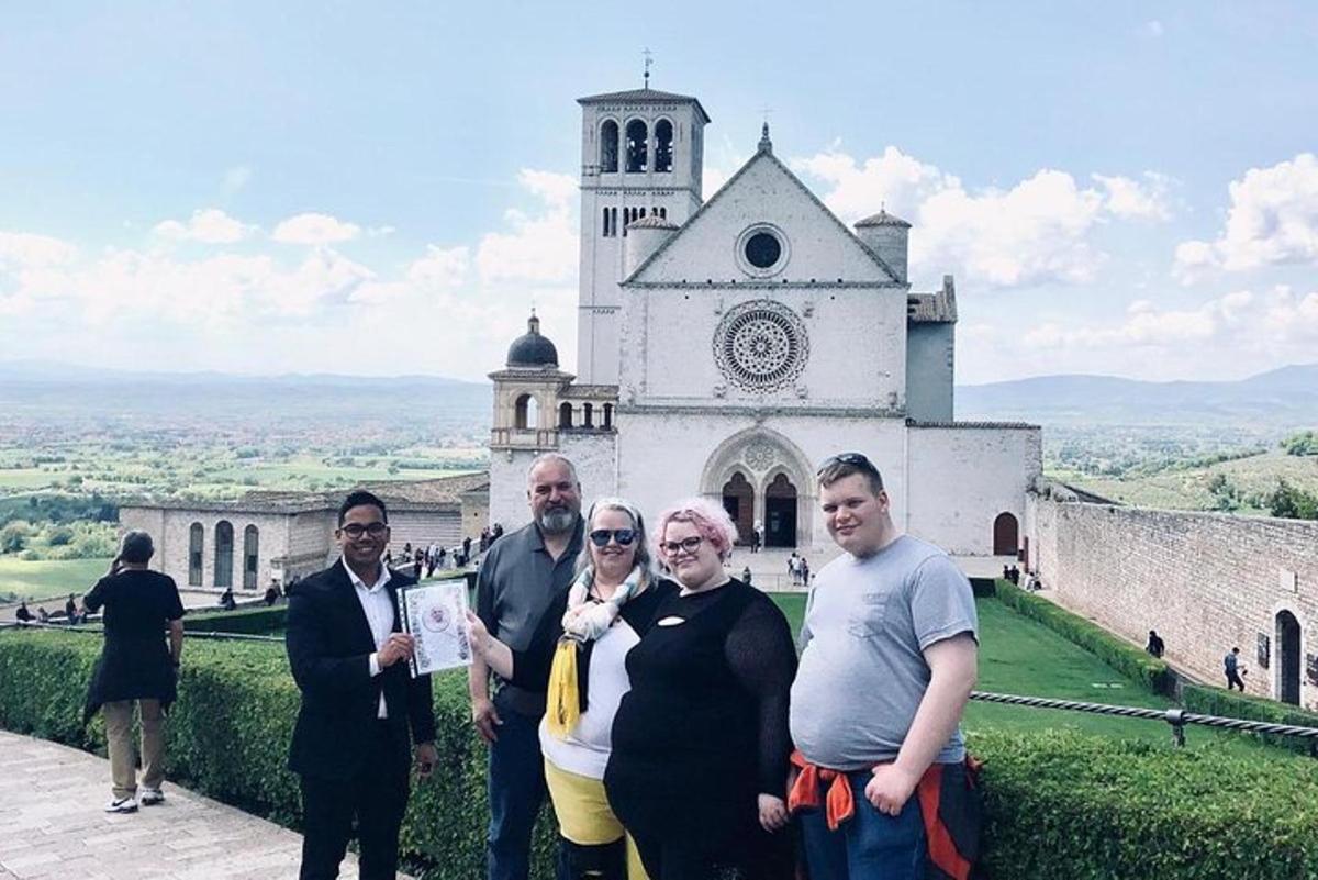 a group of people standing in front of a castle