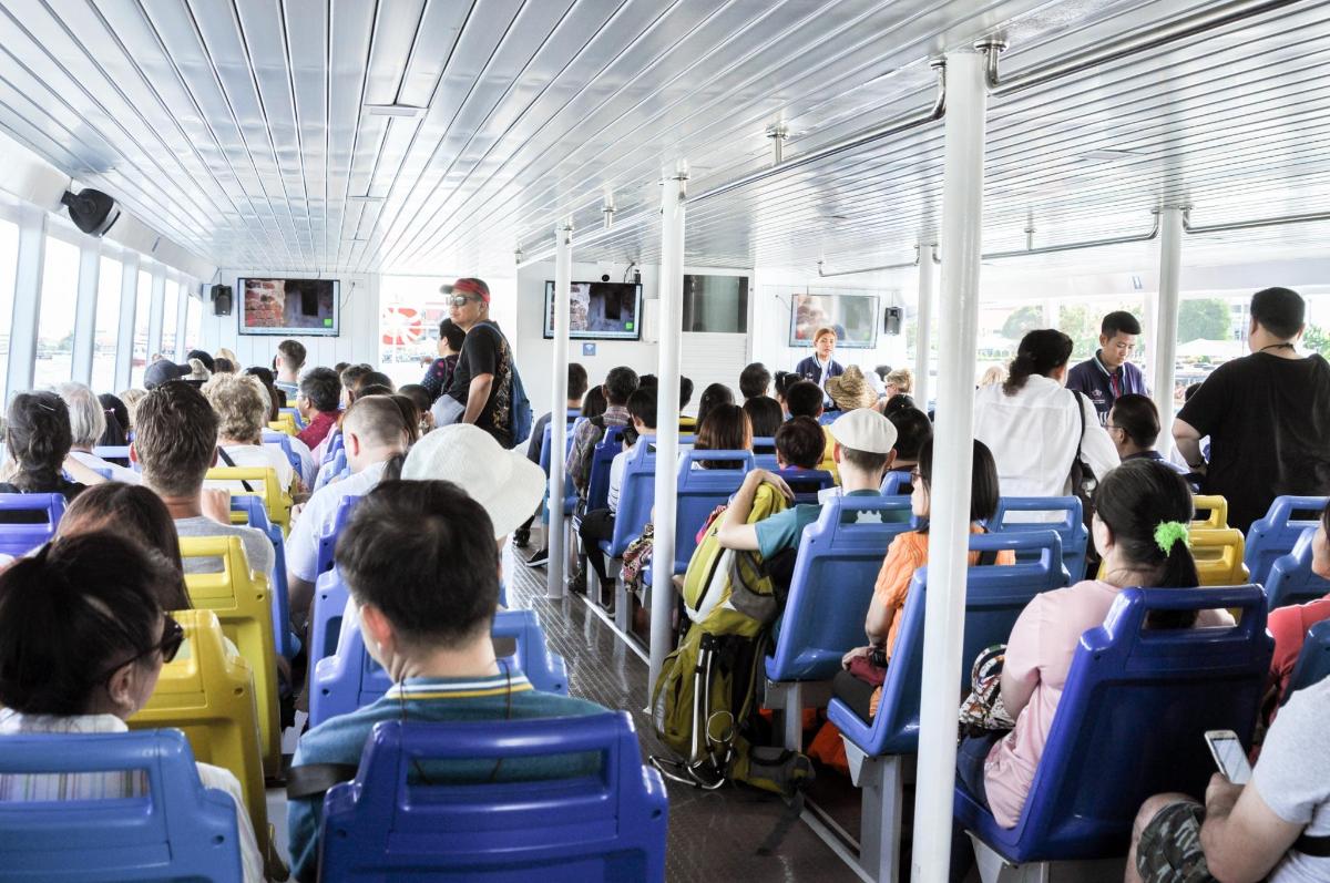 a group of people riding on a bus