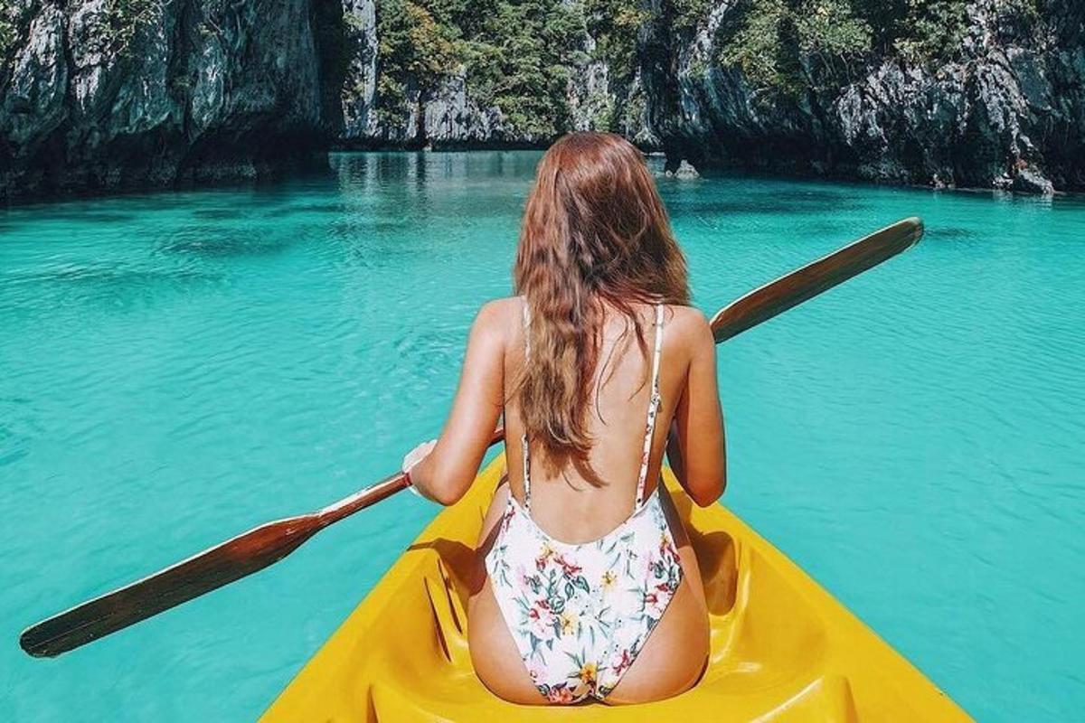 a woman in a kayak in the water