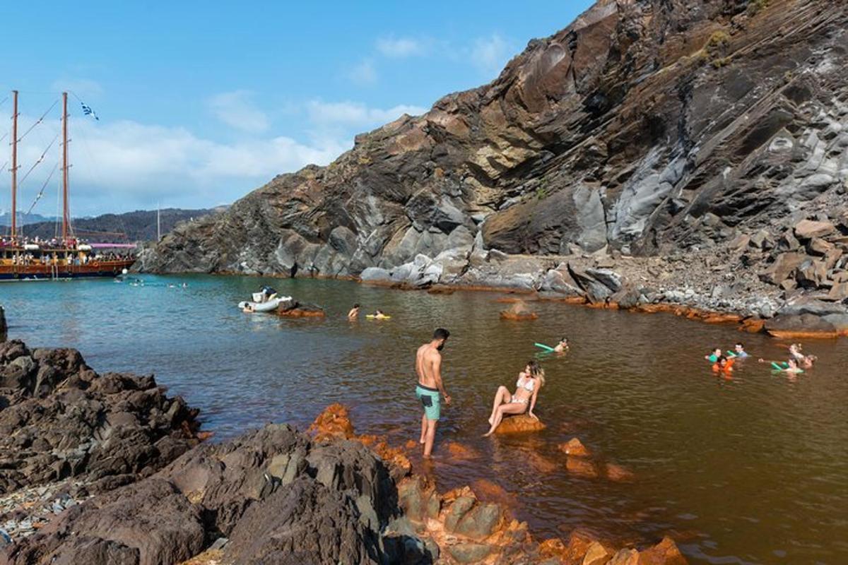 a group of people swimming in a body of water