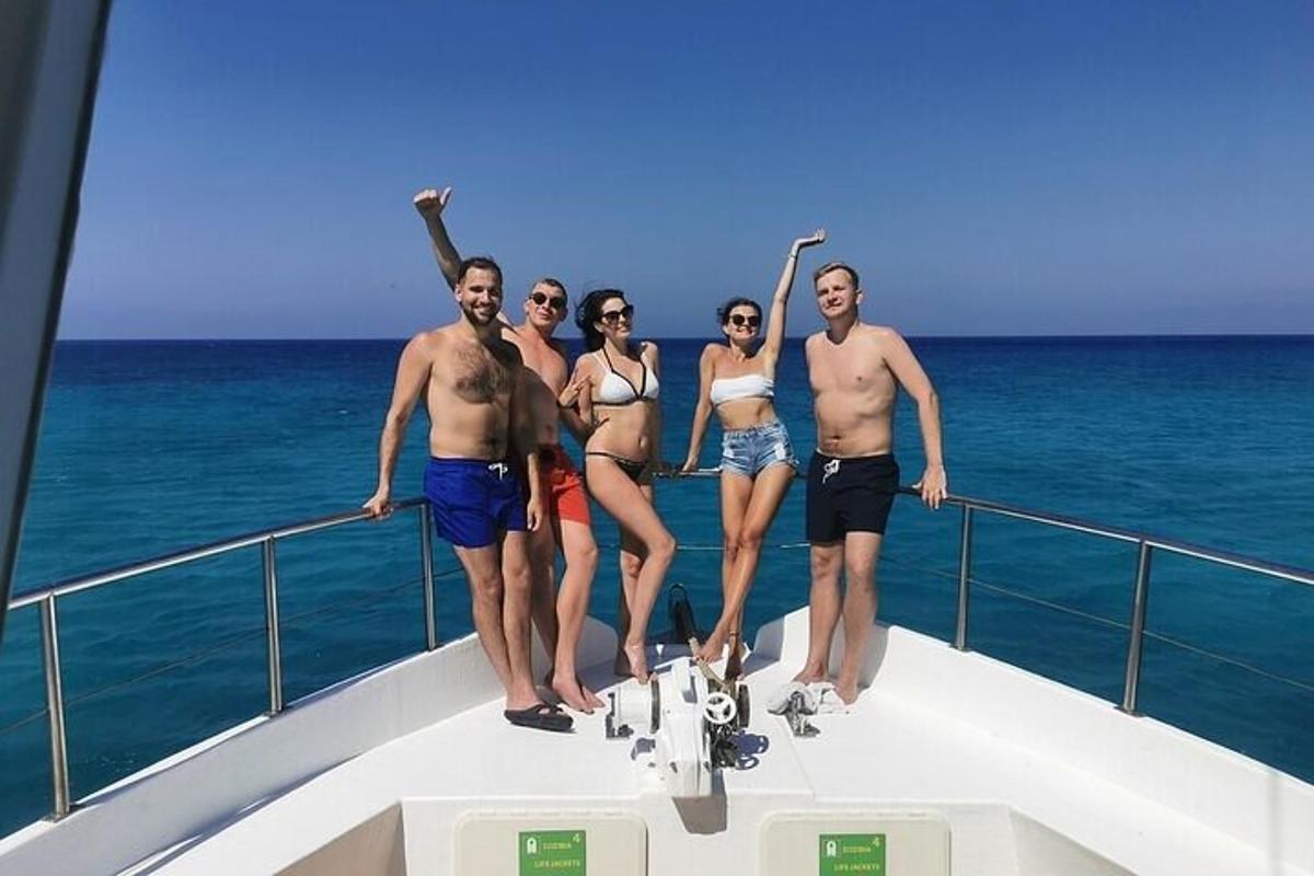 a group of people standing on a boat