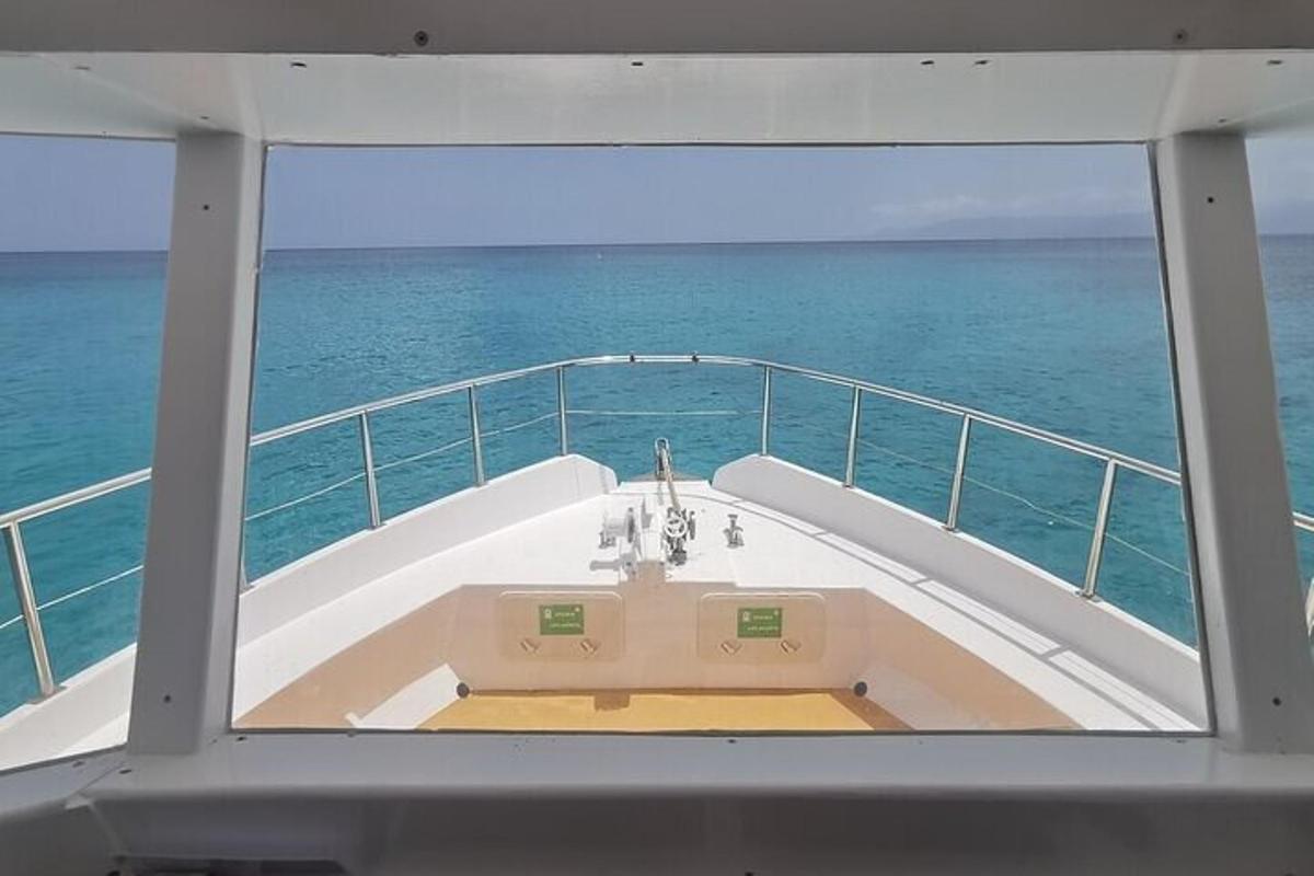 a boat with a bath tub on the ocean