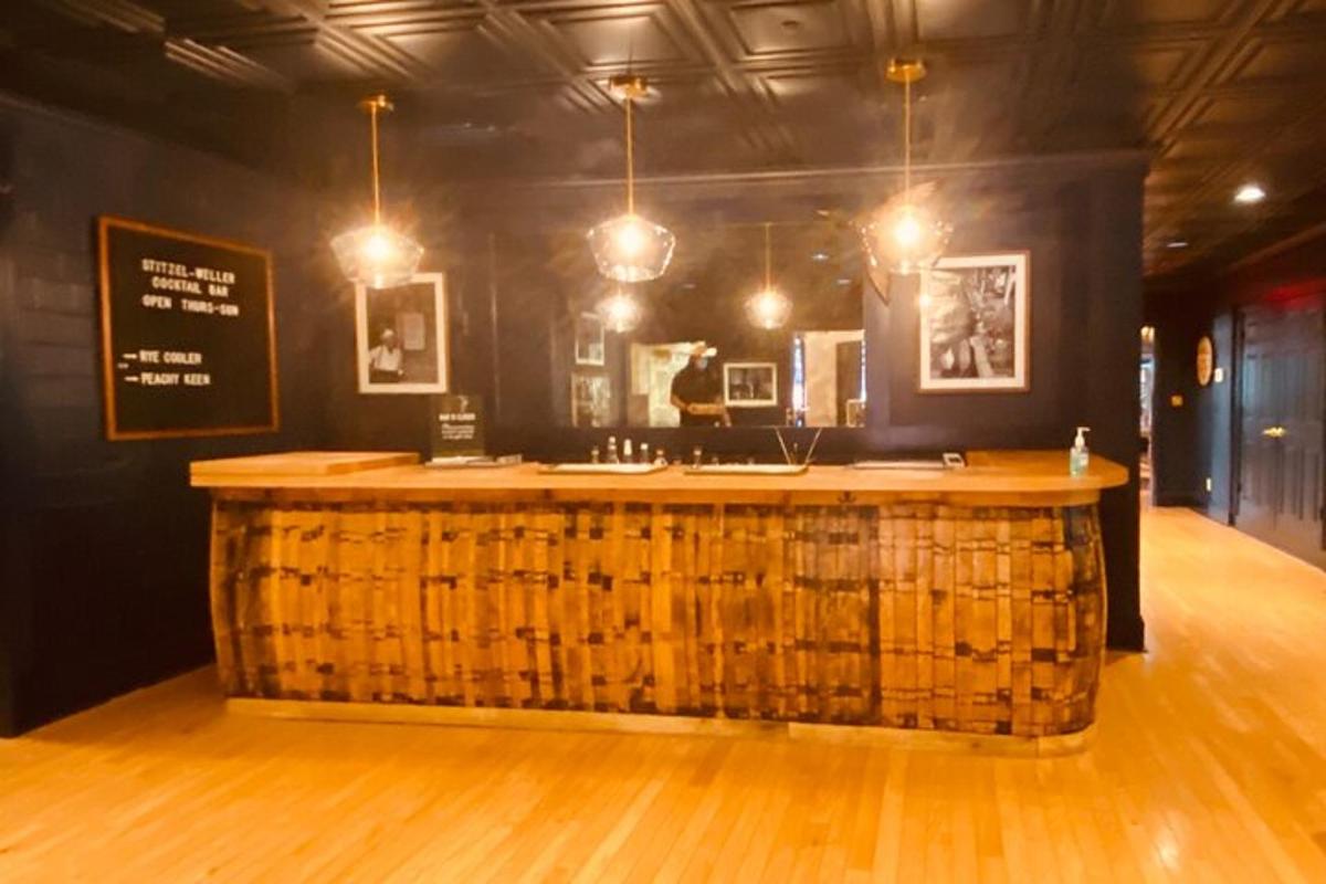 a bar with a wooden counter in a room