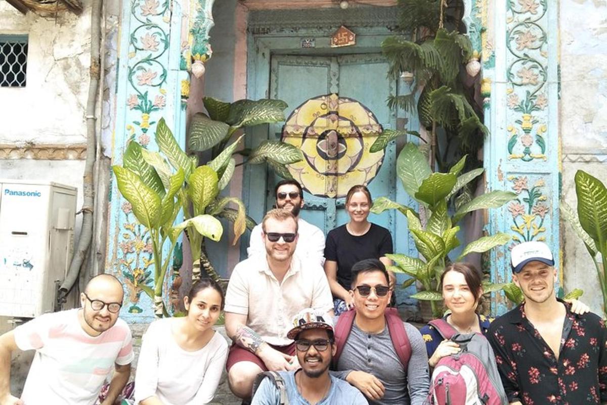 a group of people standing in front of a building
