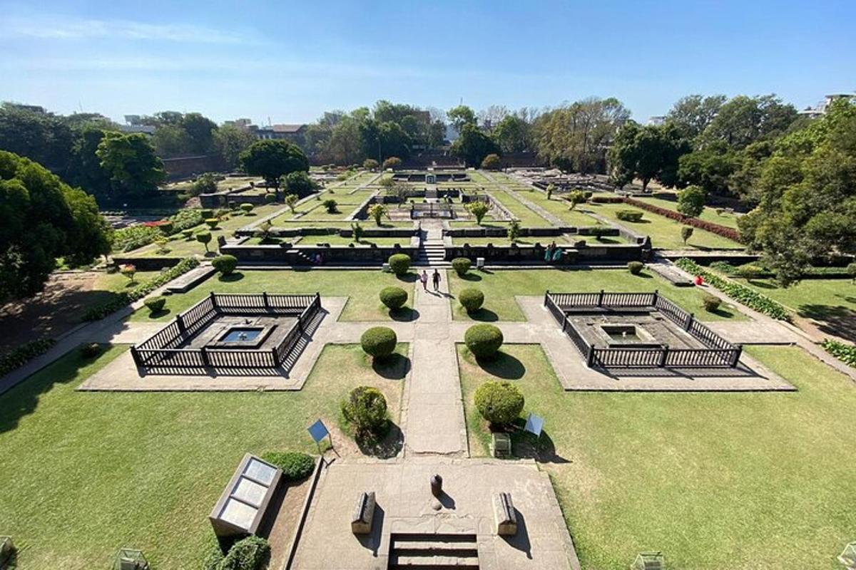an aerial view of a garden with a park