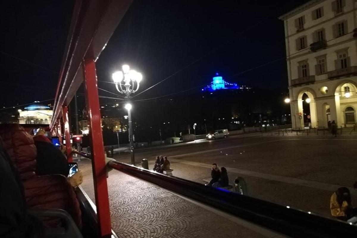 a view of a street at night with a building