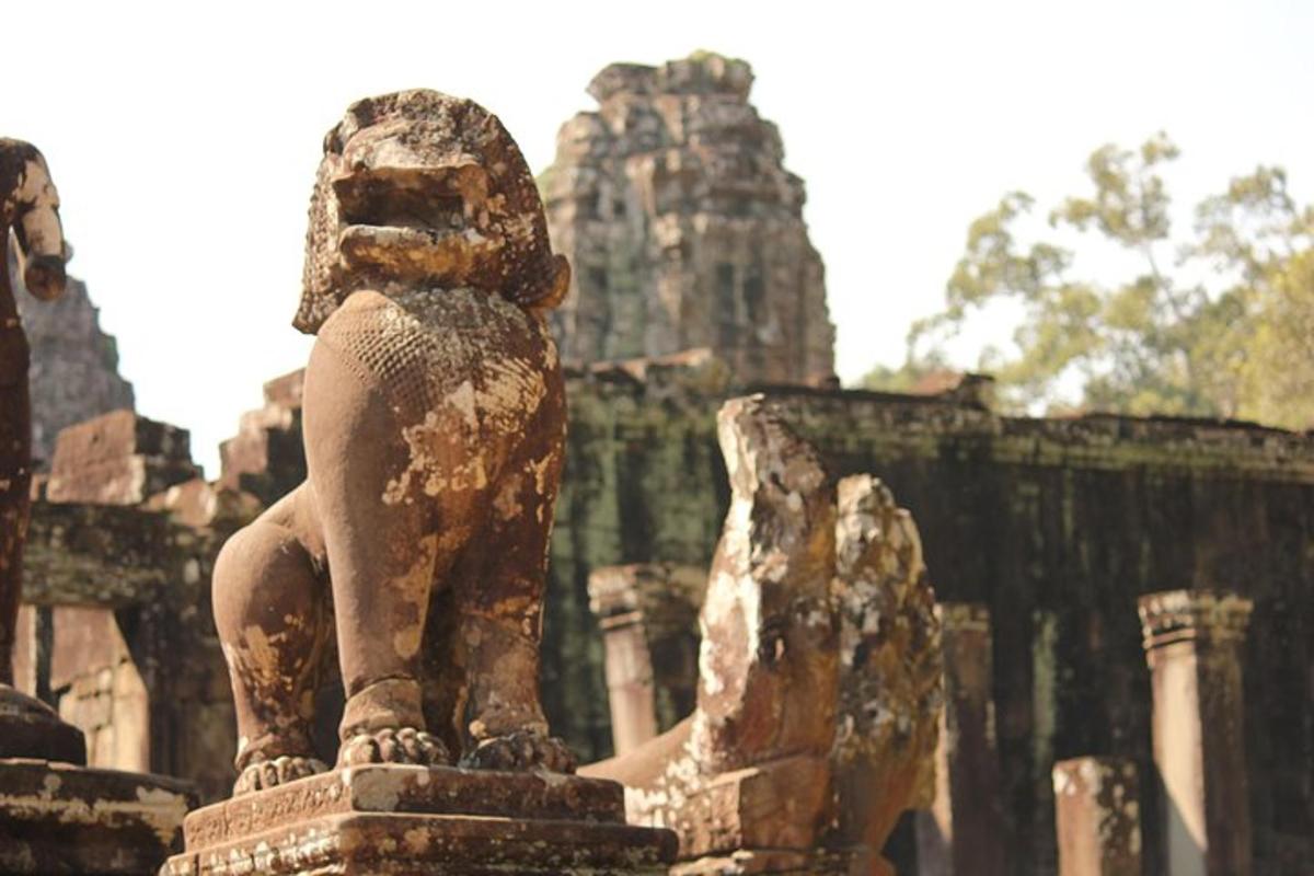 a statue in front of a temple