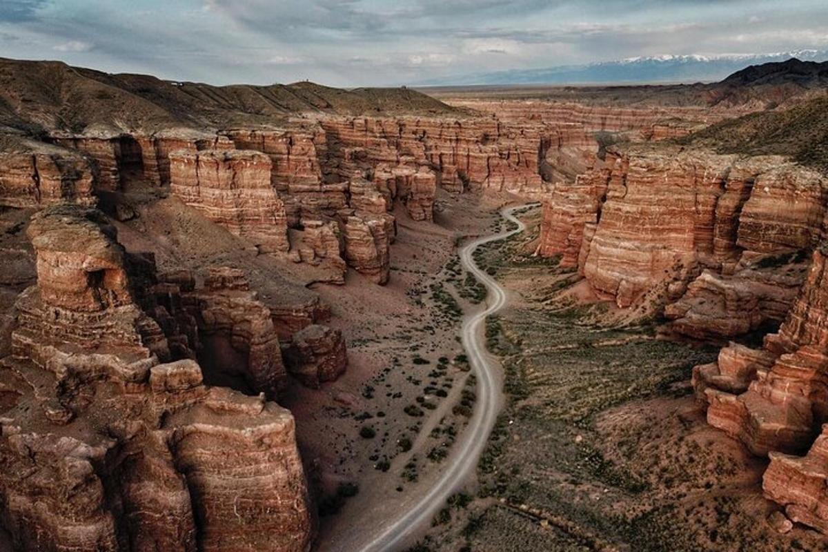 arial view of a canyon with a road in it