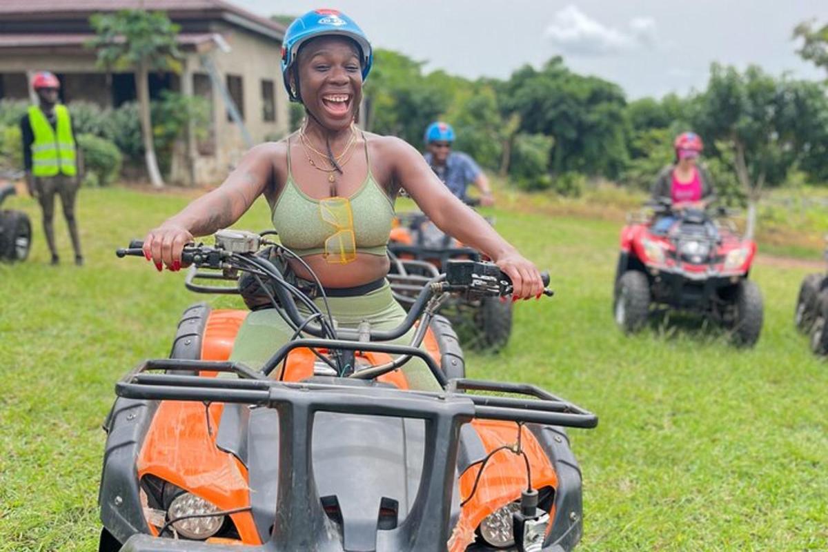 a woman in a bikini riding on a four wheeler