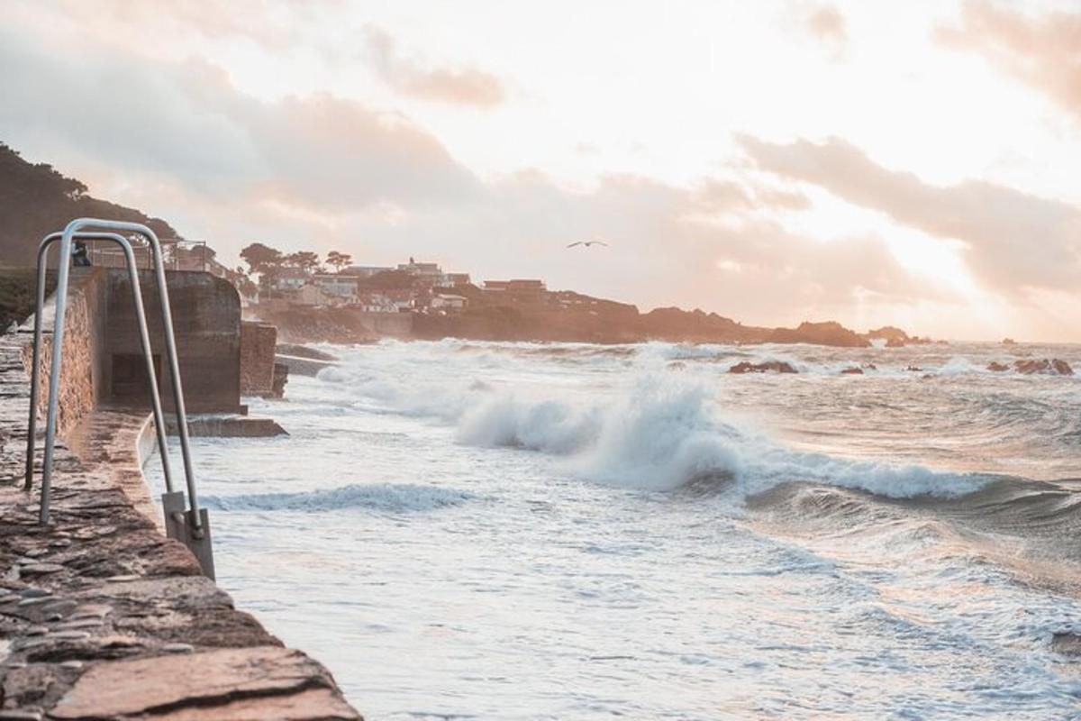 a wave breaking on the shore of a beach
