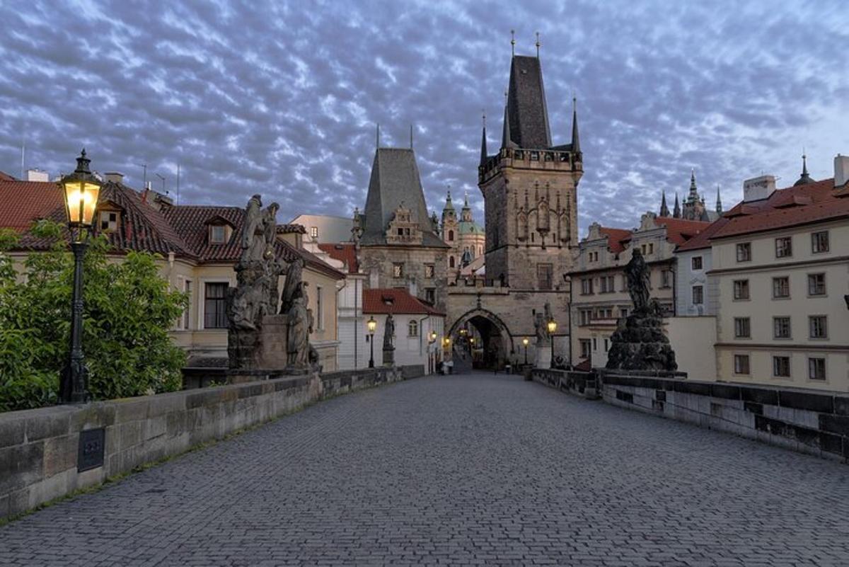 a city street with a building with a clock tower