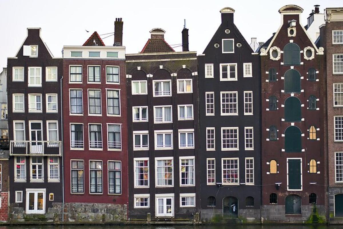 a group of buildings next to the water