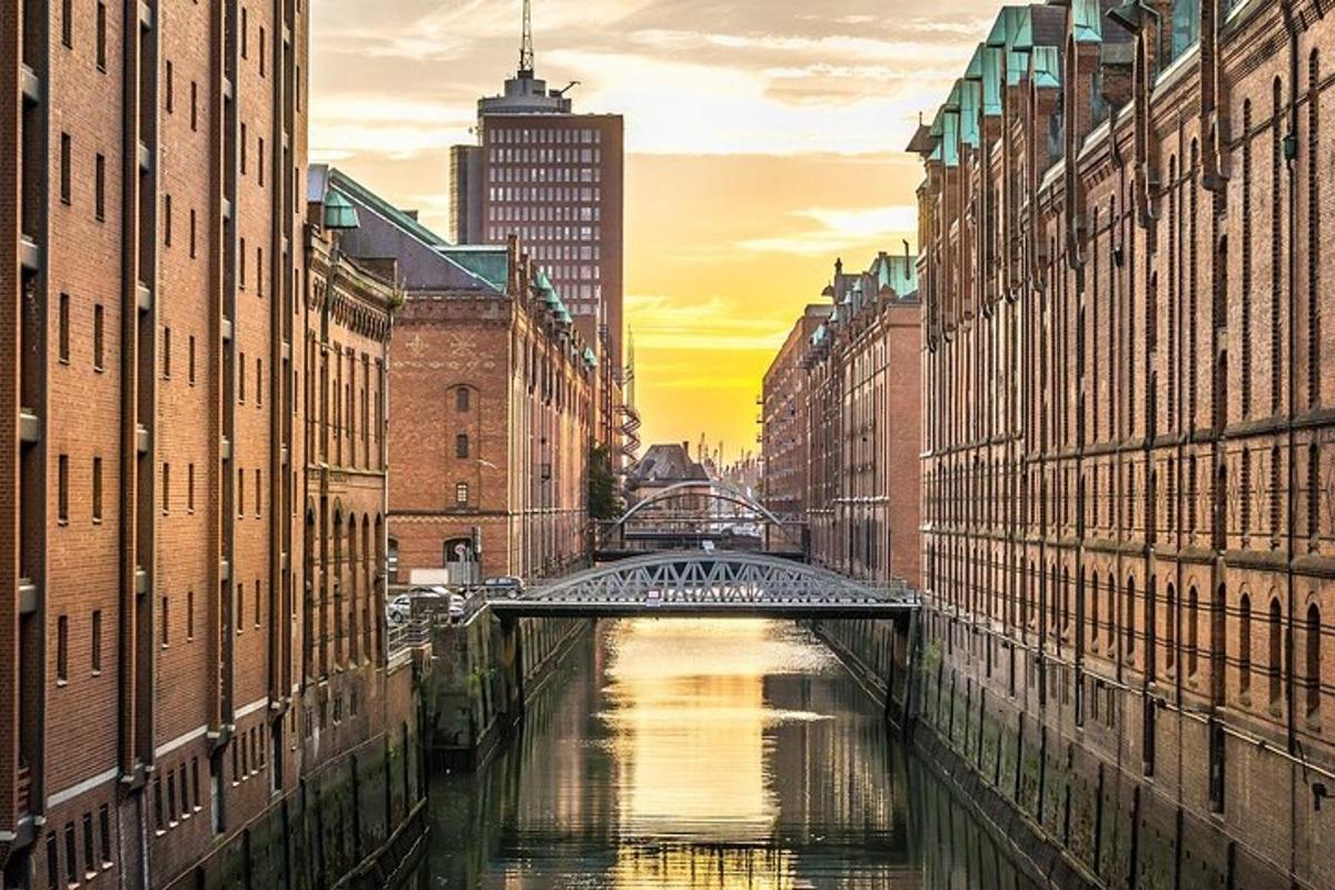 a bridge over a river in a city with buildings