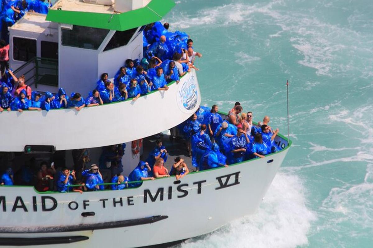 a group of people on a boat in the water