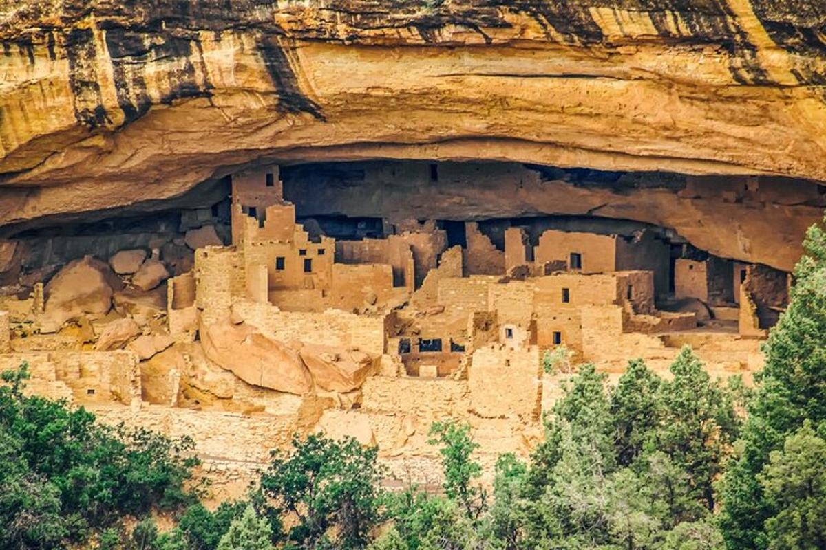 a large building on the side of a cliff