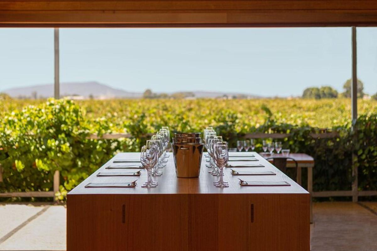 a table with wine glasses sitting on top of it