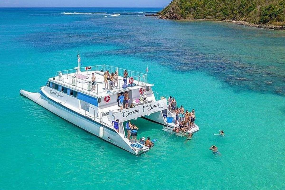 a group of people on a boat in the water