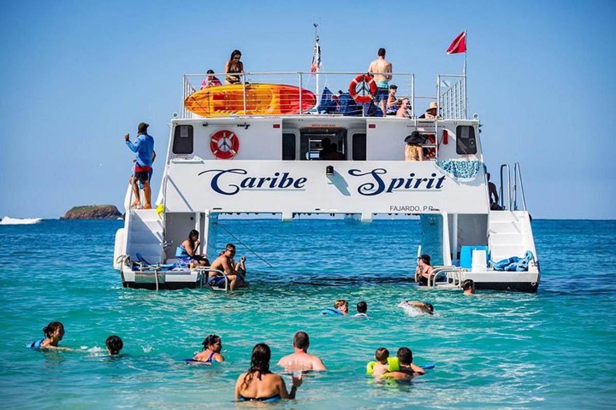 a group of people in the water on a boat