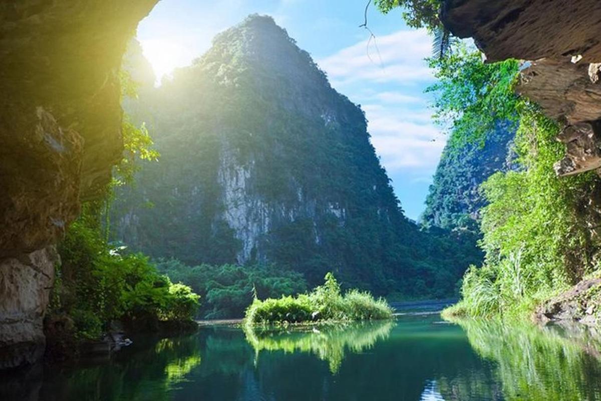 a view of a river with a mountain in the background