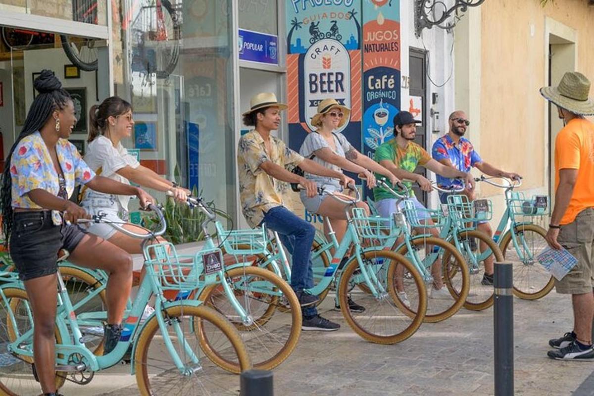 a group of people on bikes parked on a street