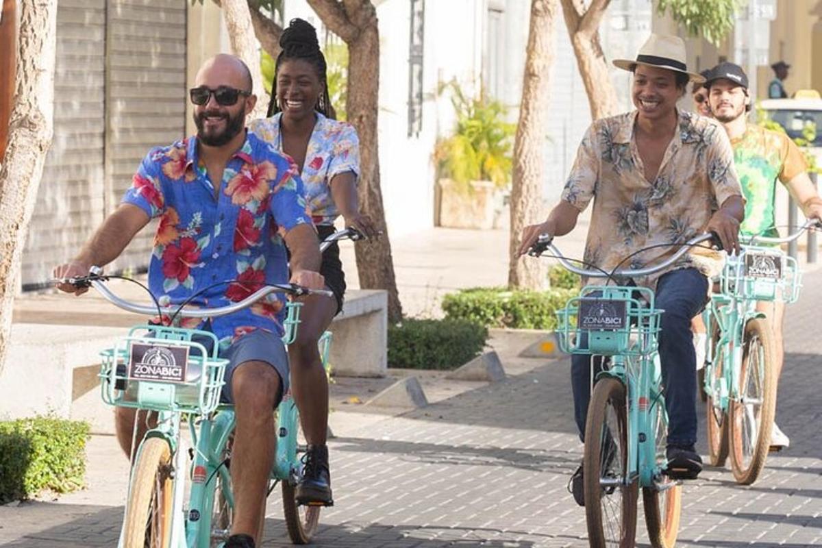 a group of people riding bikes down a street