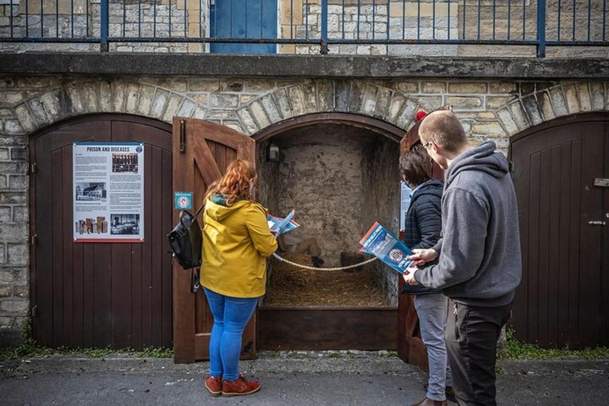 a group of people standing in front of a machine