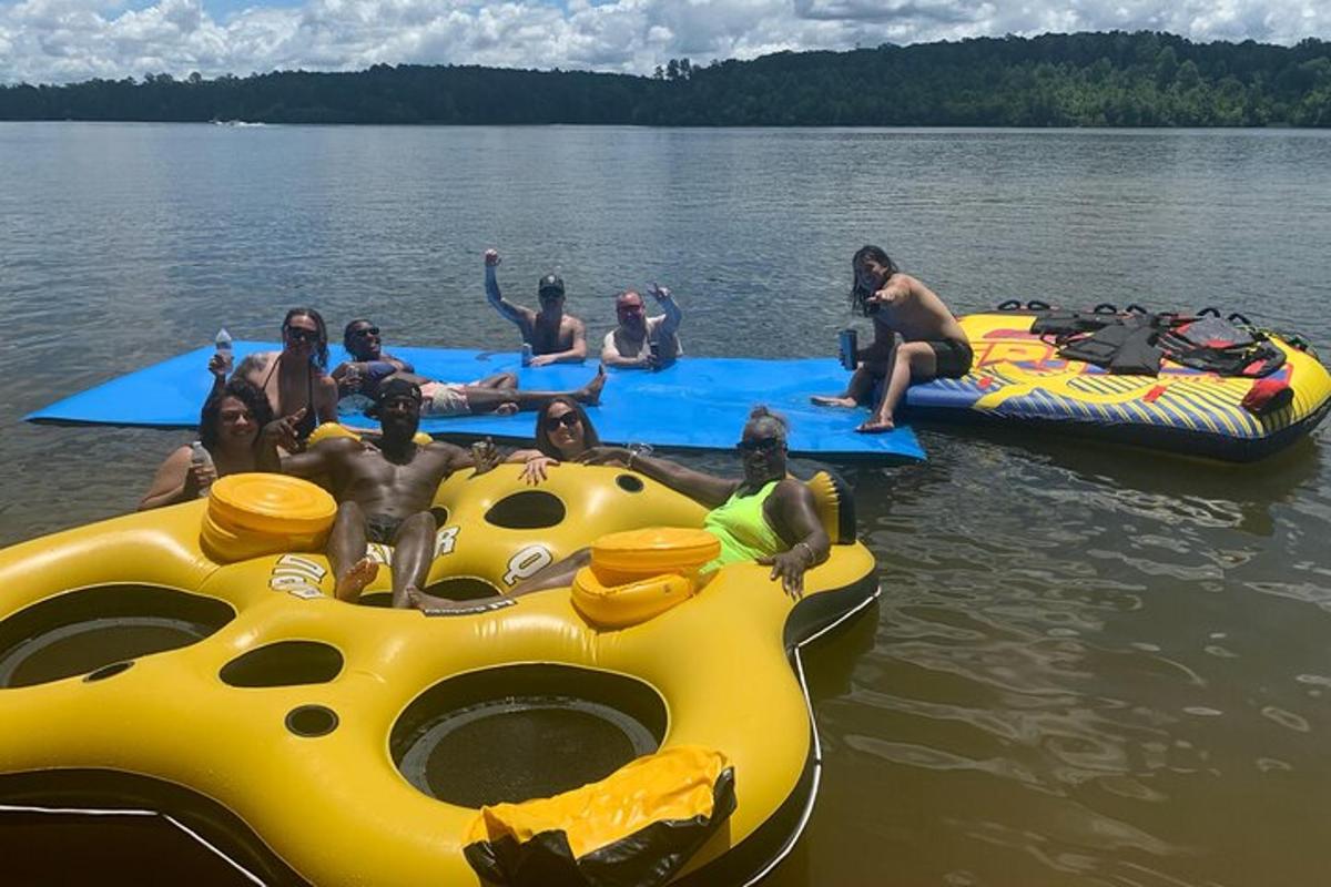 a group of people sitting on rafts in the water