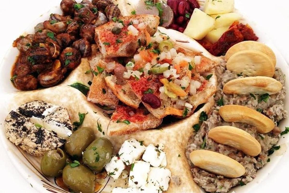 a plate of food with pizza and other foods