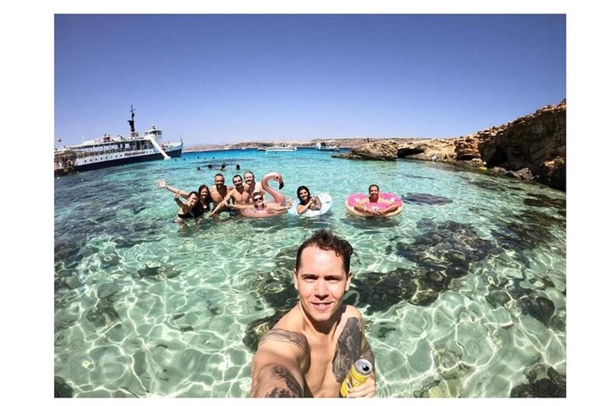 a group of people swimming in the water