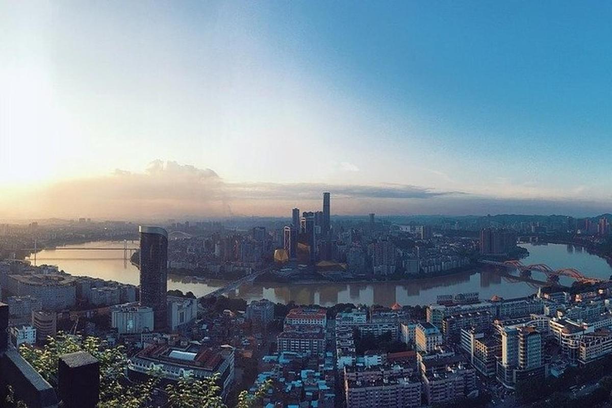 a view of a city with a river and buildings