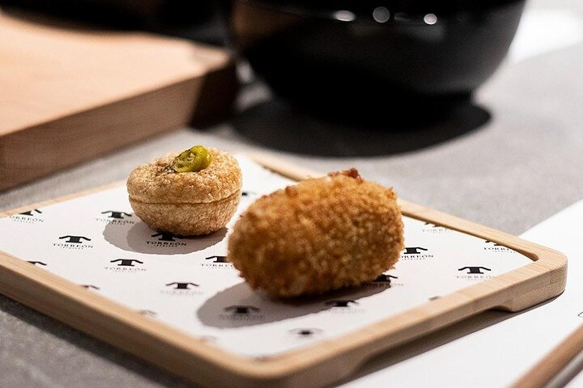 a muffin sitting on a plate on a table