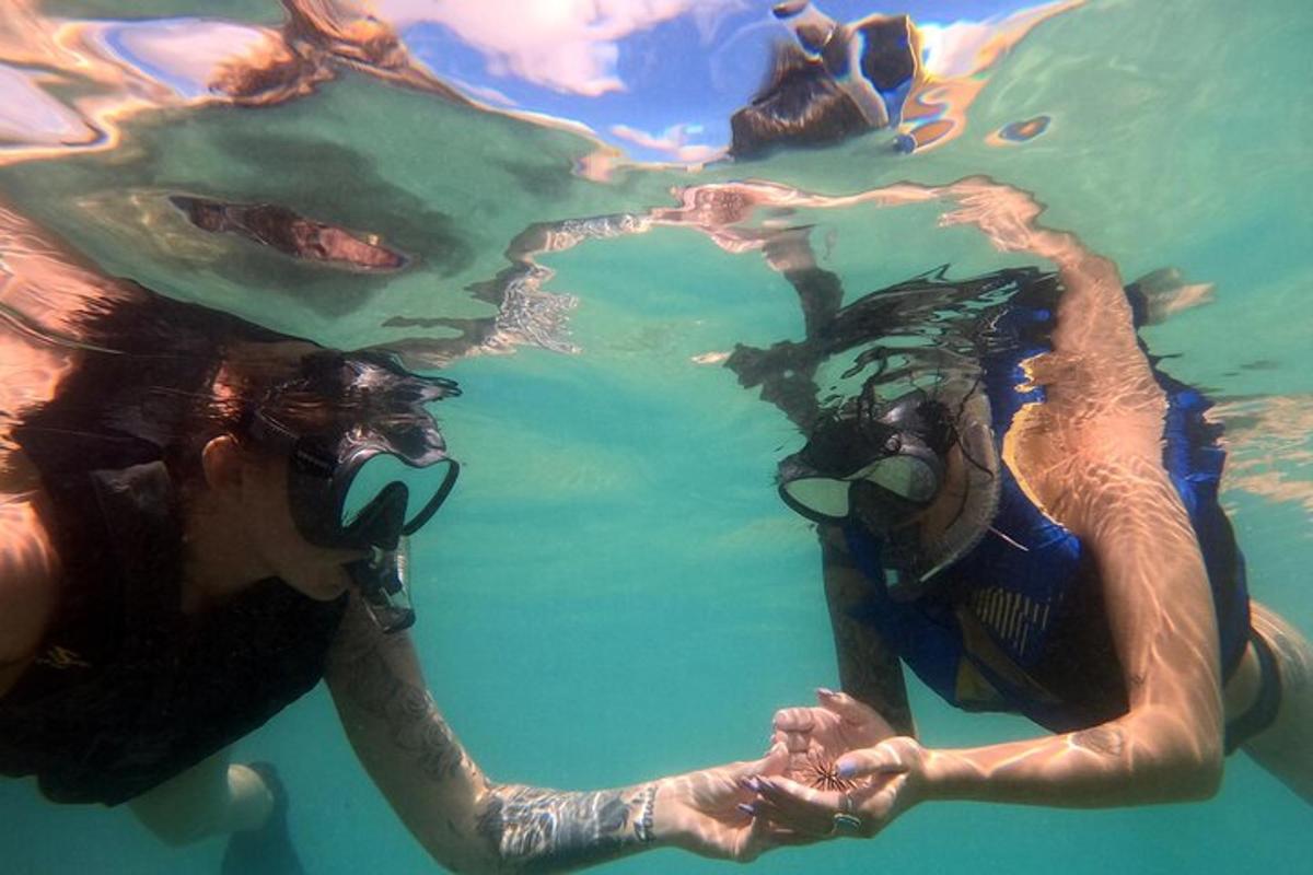 two people are floating in the water