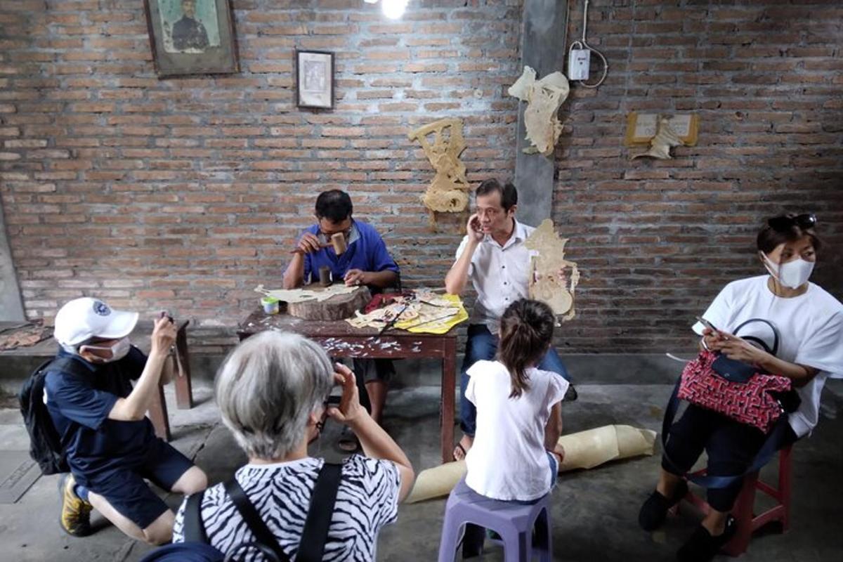 a group of people sitting around a table