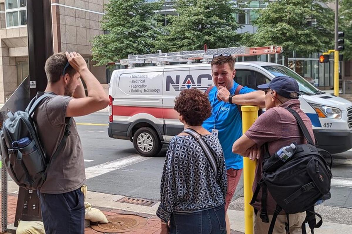 a group of people standing on a street corner