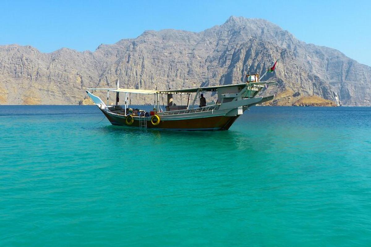 a boat in the middle of a large body of water