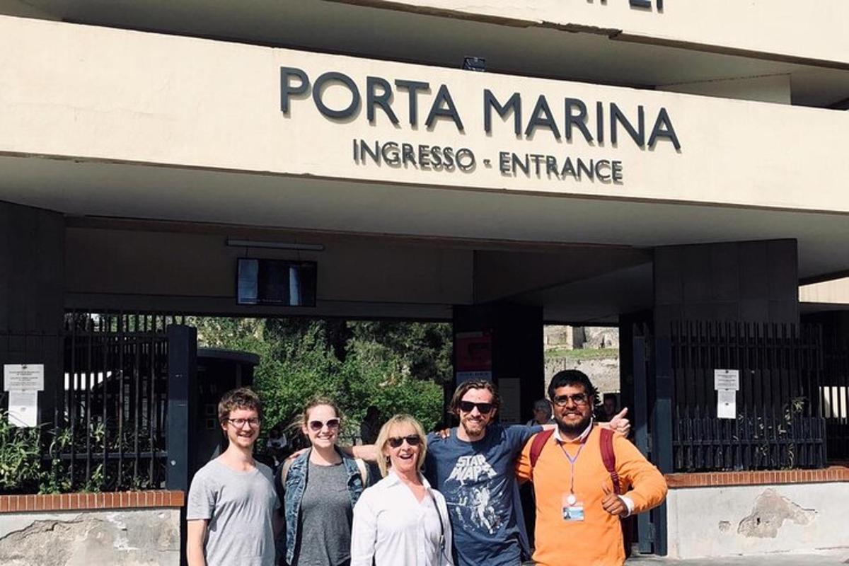 a group of people standing in front of a building
